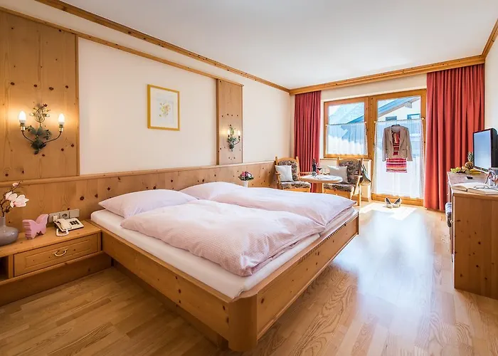 Апартаменты Appartementhaus Alpenrose Пертизау