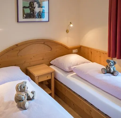 Апартаменты Appartementhaus Alpenrose Пертизау